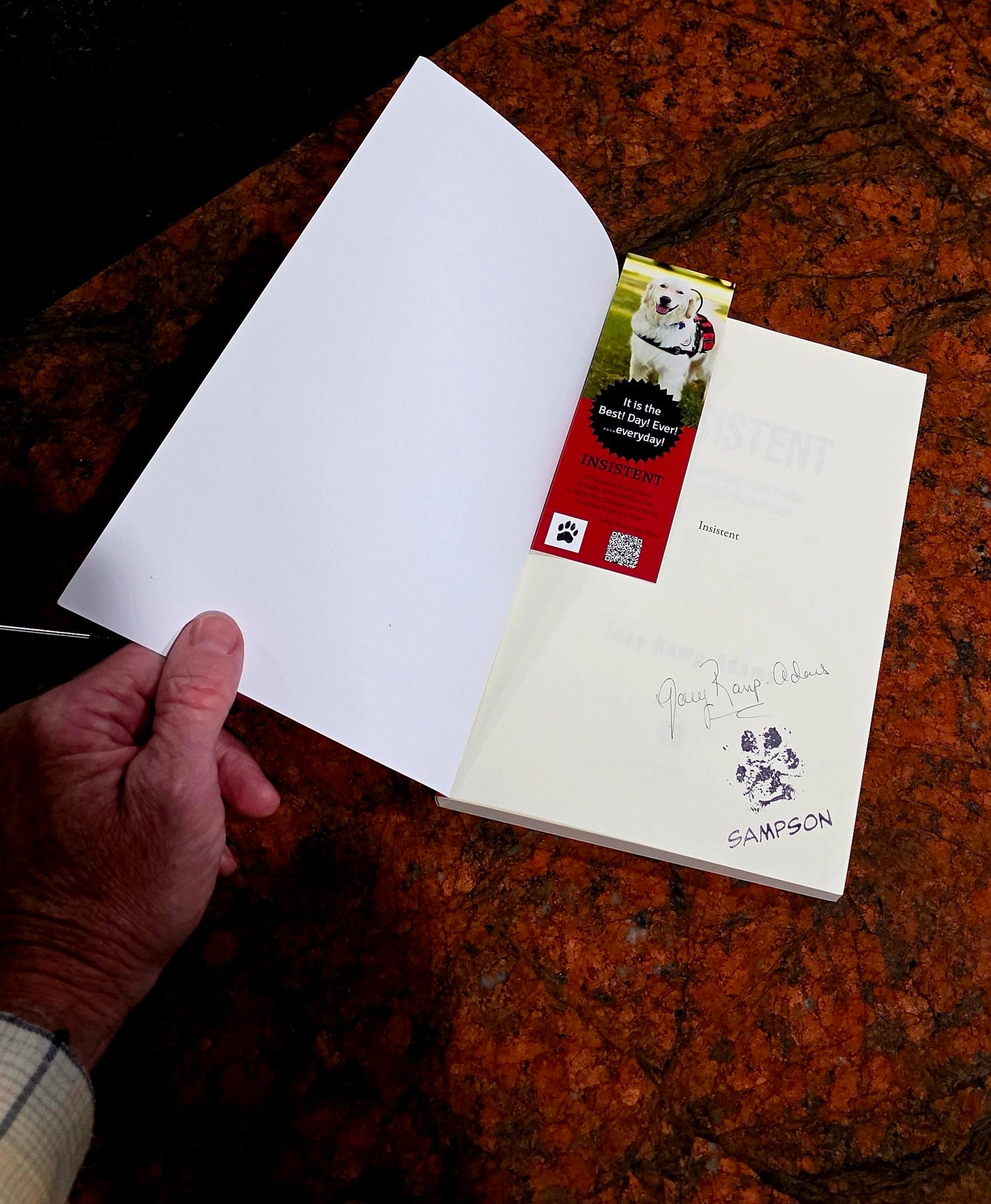 Autographed and pawtographed copy of INSISTENT: The Bond That Fueled a Global Fight for Inclusion